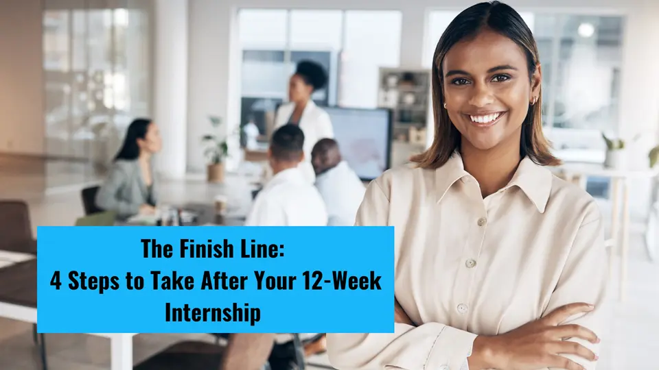 A young, confident-looking female intern is standing facing and smiling at the camera with a team of professional people in the background.